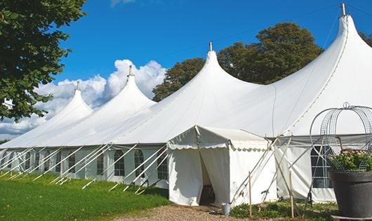 a group of luxury portable toilets with individual stalls and running water in Bon Aqua